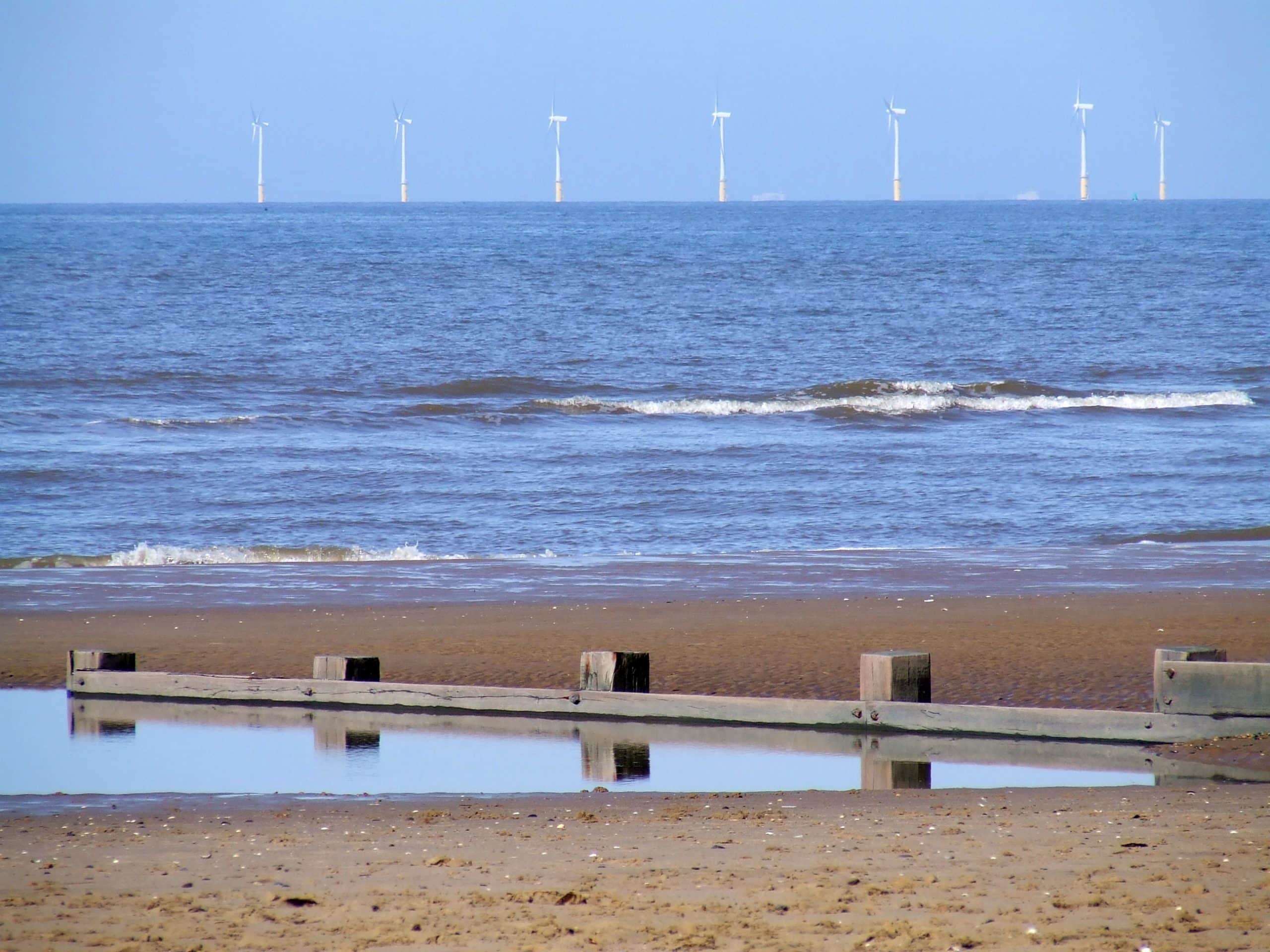 Offshore wind turbines near beach